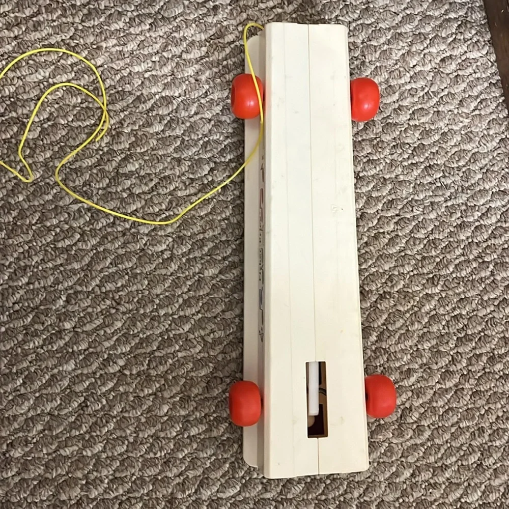 Fisher-Price Rainbow Xylophone Toy with Red Wheels
